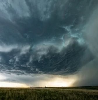 storm clouds above a field